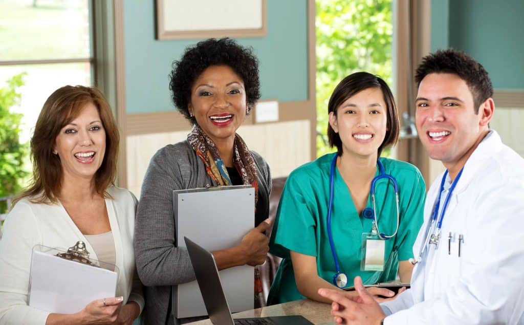 Health Care Providers smiling at camera